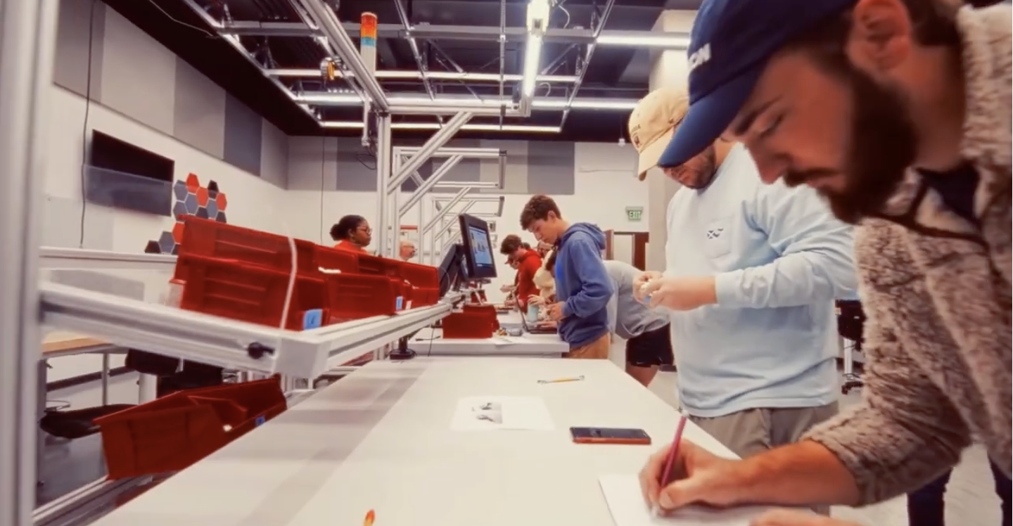 Students working at a lab table.